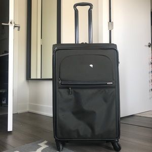 Tumi Medium Sized Roller Luggage